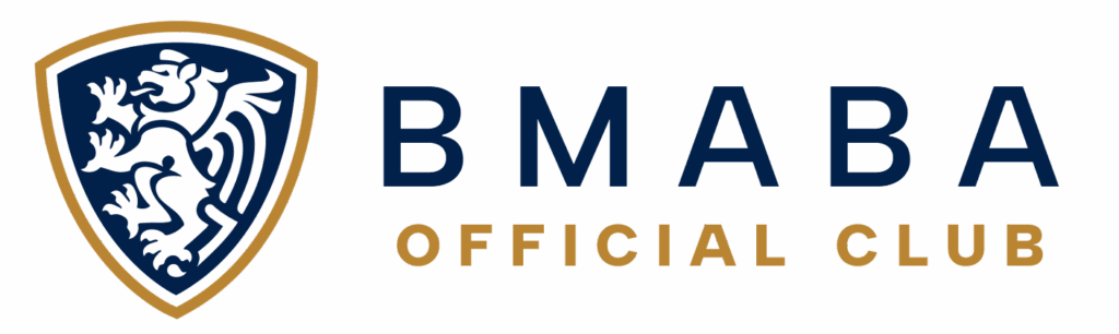 BMABA Official Club badge featuring blue and gold shield with lion emblem, representing accredited and registered martial arts club status.